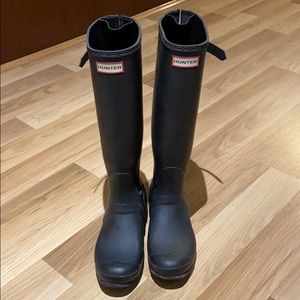 Matte black tall Hunter boots